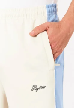 ATLAS TRACK PANTS WARM WHITE SPRING BLUE
