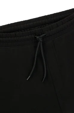 Jogginghose aus Baumwoll-Terry mit blauem Logo-Aufnäher