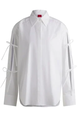 Oversized Bluse aus Baumwolle mit Schleifen am Ärmel